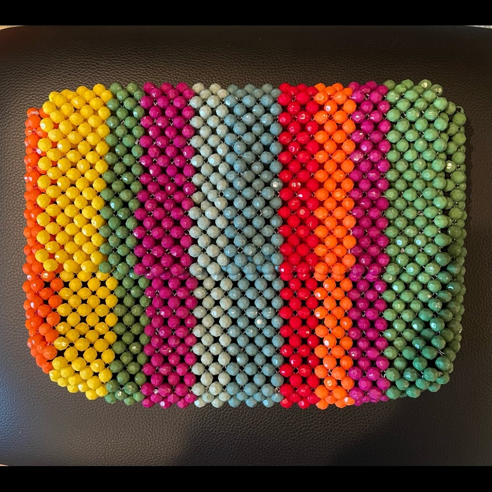 This is a beaded bag that’s medium size/no strap